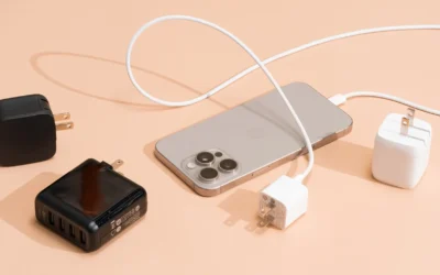 Various mobile chargers including wall chargers, wireless pads, and portable power banks displayed on a white background.